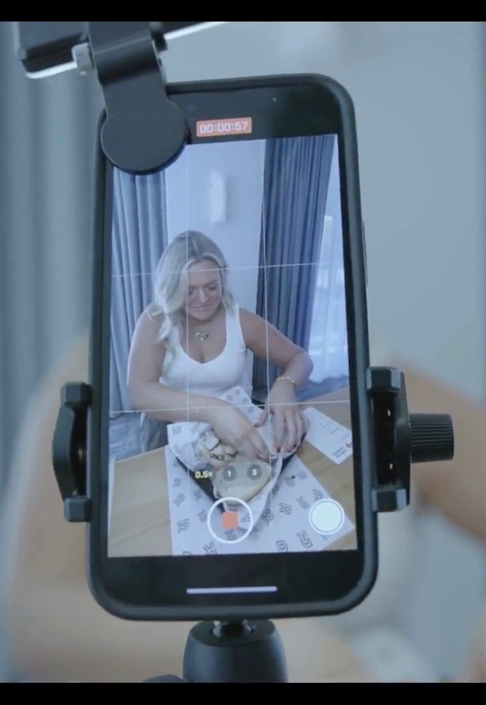 A creator filming content during the Revolution Cooking influencer trip